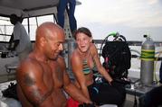 Charlie & Amy on dive boat at BIBR Roatan Honduras