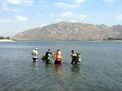 Search teams in the lake at Perris for training